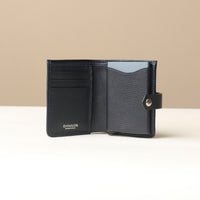 Open Blue RFID card case showing aluminum pop-up holder and additional card slots