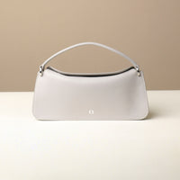 Front view of white Penelope Mini small leather handbag for versatile everyday use