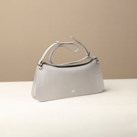 Front view of silver Penelope Mini small leather handbag for versatile everyday use