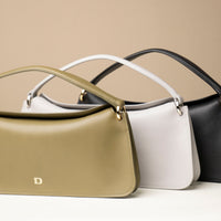 Three variant of Penelope Mini small leather handbag for versatile everyday use