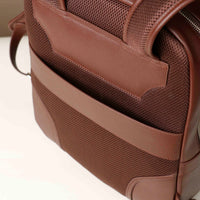 Close-up of a brown backpack with textured surface