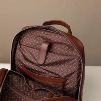 Brown patterned backpack on a neutral background