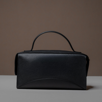 Back View of Black Avela Bag with top handle and detachable strap
