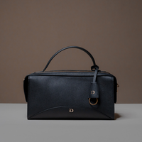 Front View of Black Avela Bag with top handle and detachable strap