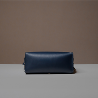 Bottom View of Blue Avela Bag with top handle and detachable strap