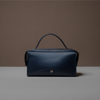Front View of Blue Avela Bag with top handle and detachable strap