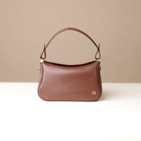 Front view of brown Hold Bag by Danilos in smooth leather