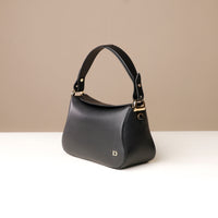 Side view of black Hold Bag by Danilos in smooth leather