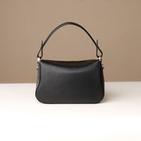Back view of black Hold Bag by Danilos in smooth leather
