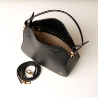 Top view of open black Hold Bag by Danilos in smooth leather
