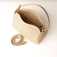 Top view of open beige Hold Bag by Danilos in smooth leather