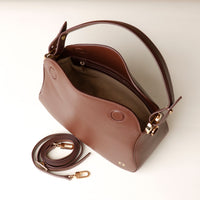 Top view of open brown Hold Bag by Danilos in smooth leather