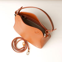 Top view of open brown Hold Bag by Danilos in smooth leather