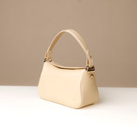 Side view of white Hold Bag by Danilos in smooth leather