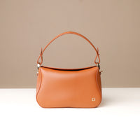 Front view of brown Hold Bag by Danilos in smooth leather