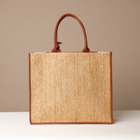 Back View of Raffia Mercatto tote bag, a lightweight, artisanal woven bag crafted from natural raffia.