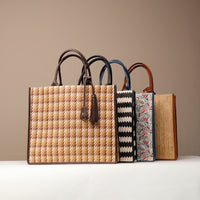 A collection of Raffia Mercatto Tote Bags in various patterns and color combinations, featuring a common design with leather details.