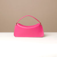 Back view of pink Penelope Mini small leather handbag for versatile everyday use
