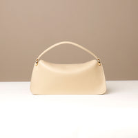Back view of beige Penelope Mini small leather handbag for versatile everyday use