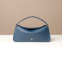 Front view of blue Penelope Mini small leather handbag for versatile everyday use