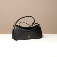 Front view of black Penelope Mini small leather handbag for versatile everyday use