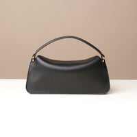 Back view of black Penelope Mini small leather handbag for versatile everyday use