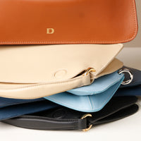 Close up view on Penelope Mini small leather handbag for versatile everyday use
