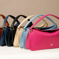 All variants of Penelope Mini small leather handbag for versatile everyday use