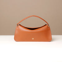 Front view of Brown Penelope Mini small leather handbag for versatile everyday use