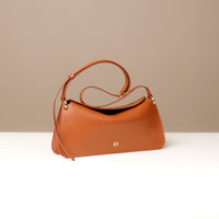 Brown Penelope Mini small leather handbag for versatile everyday use