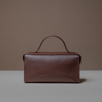 Back View of Brown Avela Bag with top handle and detachable strap