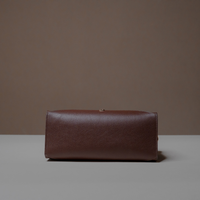 Bottom View of Brown Avela Bag with top handle and detachable strap