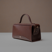 Slightly Side View of Brown Avela Bag with top handle and detachable strap