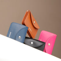 Four colorful wallets (blue, brown, black, pink) with a brand logo on a gradient background.