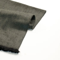 Roll of dark gray fabric on a white background