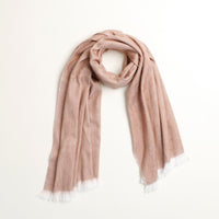 Beige scarf with white fringe on a white background