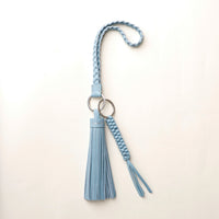 Blue stylish decorative accessories designed to add personality and flair to bags, keys, or everyday items. Perfect for gifting or styling.