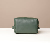 Back view of green Compact leather dopp kit for men and women by Danilos