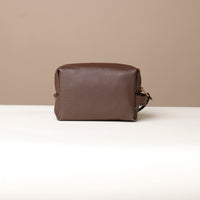 Back view of brown Compact leather dopp kit for men and women by Danilos