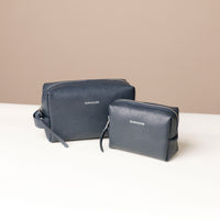 Two blue Compact leather dopp kit for men and women by Danilos