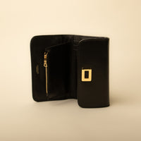 Open Sherlyn Wallet tri-fold leather wallet by Danilo’s