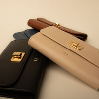 A collection of Sherlyn Wallet tri-fold leather wallet by Danilo’s