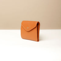 Side view of brown Danilo’s compact Anahí Wallet with card slots