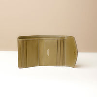 Open view of olive Danilo’s compact Anahí Wallet with card slots