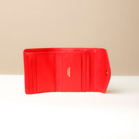 Open view of red Danilo’s compact Anahí Wallet with card slots