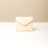 Front view of white Danilo’s compact Anahí Wallet with card slots