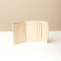 Open view of white Danilo’s compact Anahí Wallet with card slots