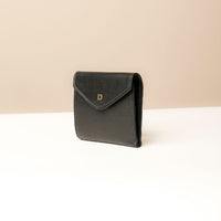 Side view of black Danilo’s compact Anahí Wallet with card slots