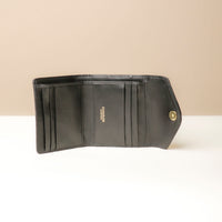 Open view of black Danilo’s compact Anahí Wallet with card slots