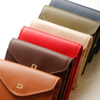 a collection of Danilo’s compact Anahí Wallet with card slots